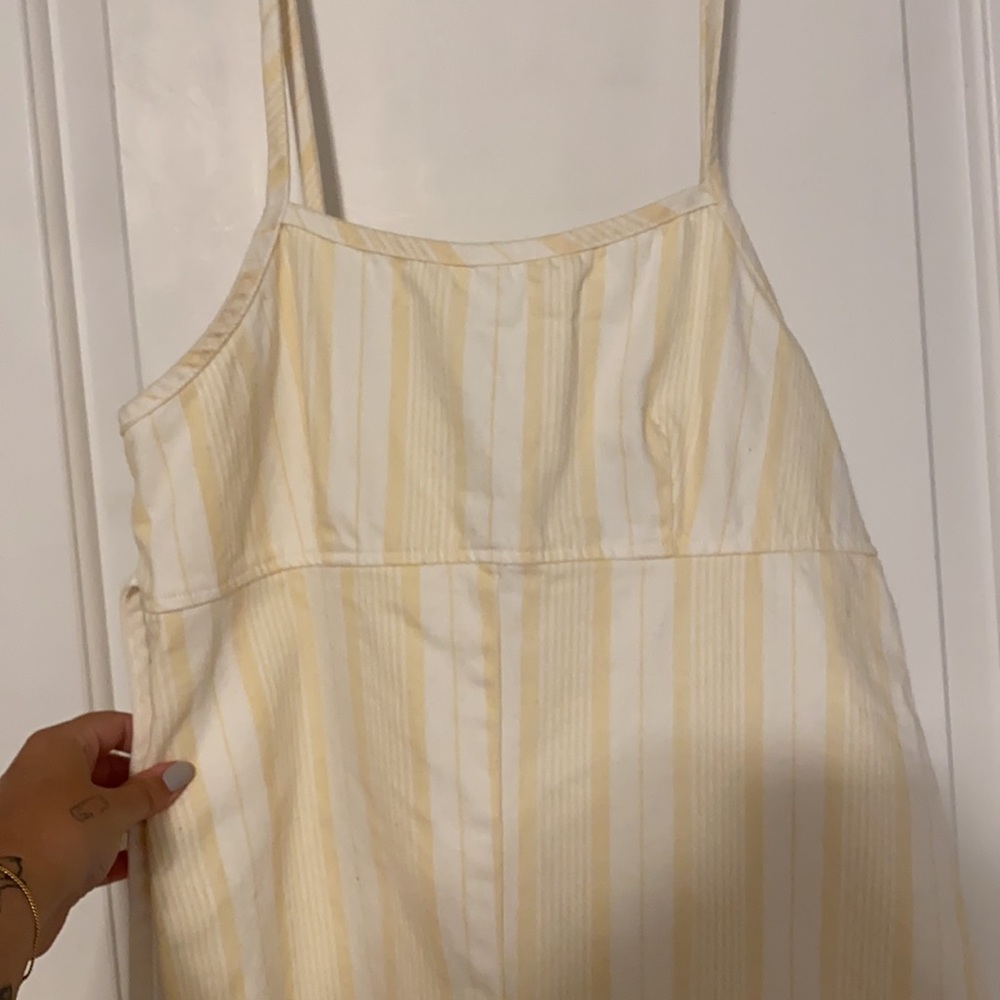 Pastel yellow with white striped romper